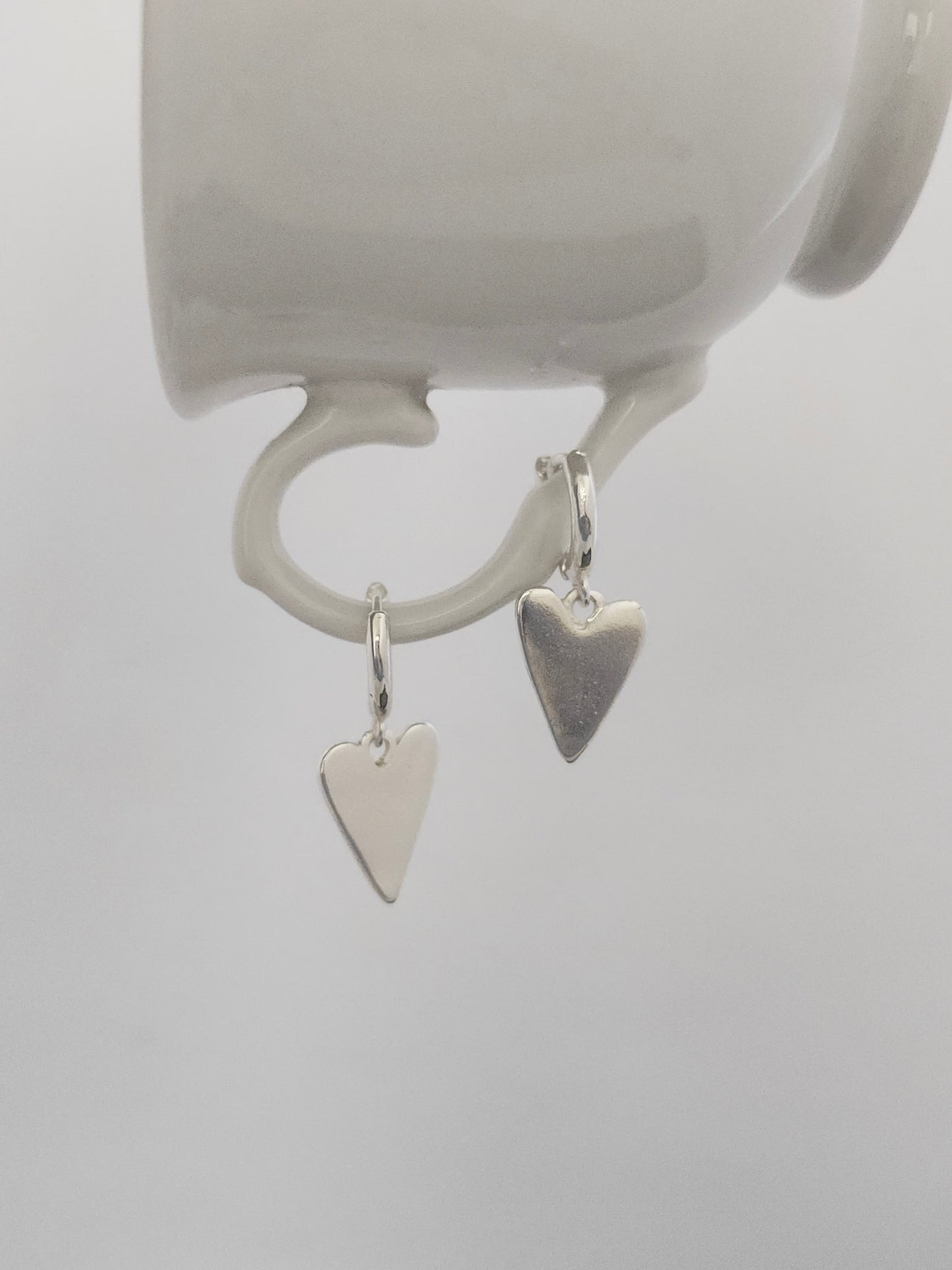 BRINCO TRAQUETA CORAÇÃO SIMPLES